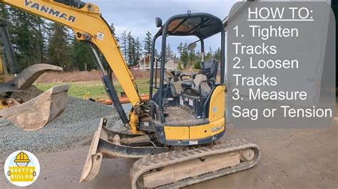 how to loosen track on mini excavator|mini track tension adjustment.